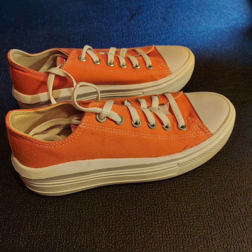 Woman's Converse Chuck Taylor All Star Move Lift Platform sneakers.